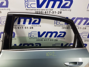 Дверь голая зад лев Volkswagen Passat B7 2.5 USA CBTA 2011 561833055C